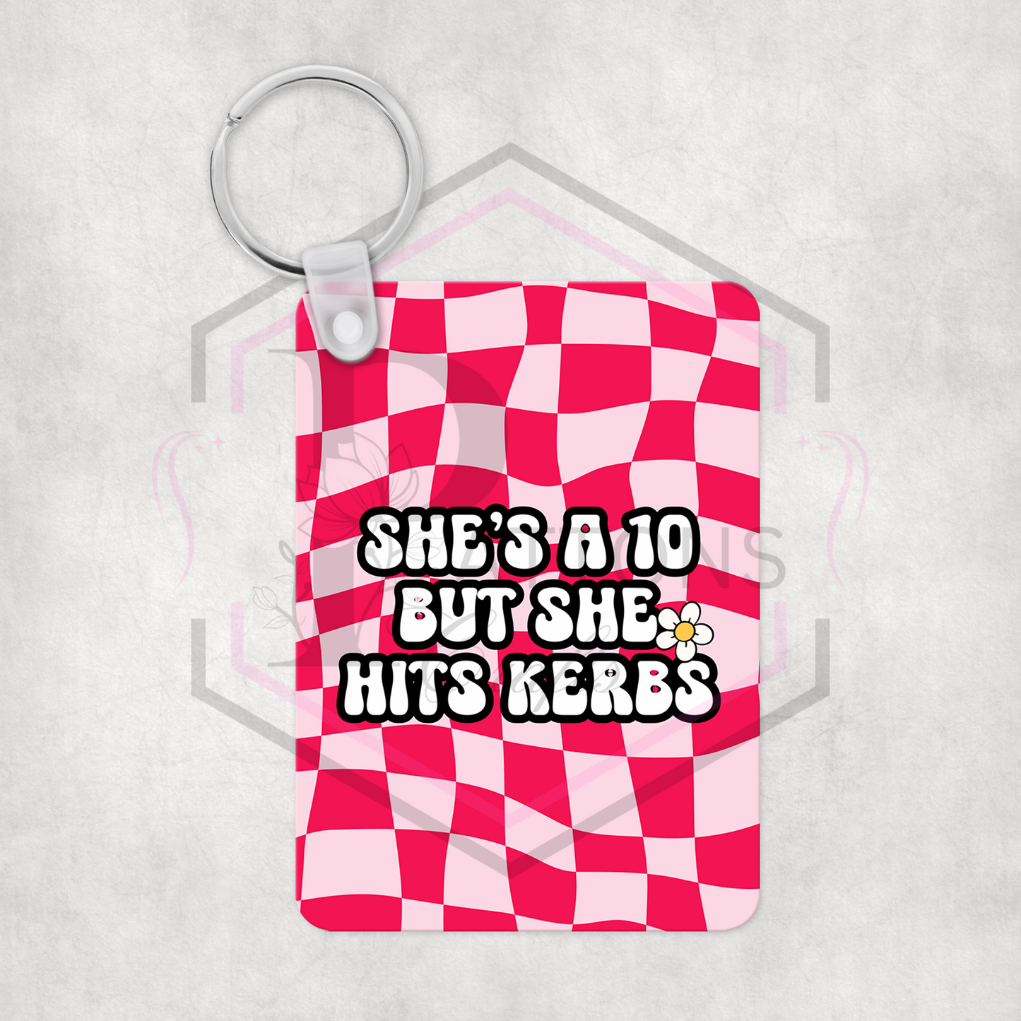 Keyring | She's a ten, But she hits kerbs